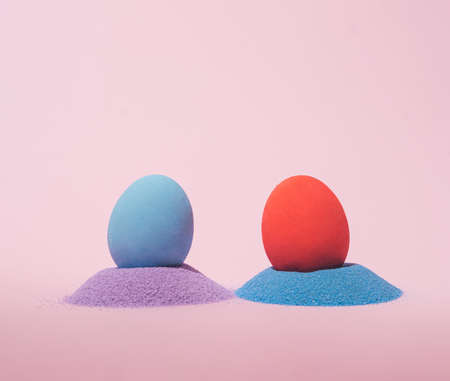 creative blooming colorful flowers concept of easter egg on grey background.minimal flat lay composition.の写真素材