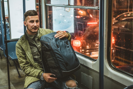 Young Man in the Bus .People, lifestyle, travel and public transport.