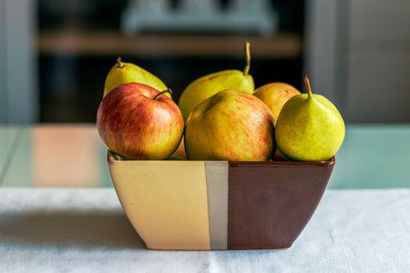 Close Up View of Apples and Pears on the Tableの写真素材