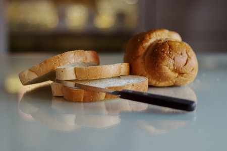 Loaf Of Wholemeal Bread With First Half Already Cut Into Slices.の写真素材