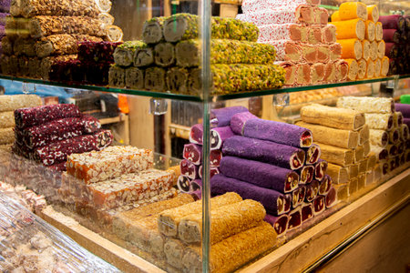 Traditional Turkish locum with nougat, nuts and fruits. Sweets and traditional oriental delights concept. Street market, Istanbul, Turkeyの写真素材