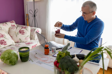Attentive dietitian providing online consultation about client's progress in identifying foods.の写真素材