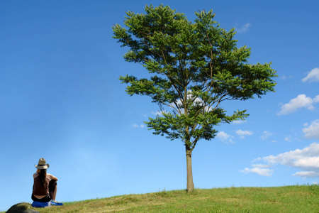 Single woman and tree                                 