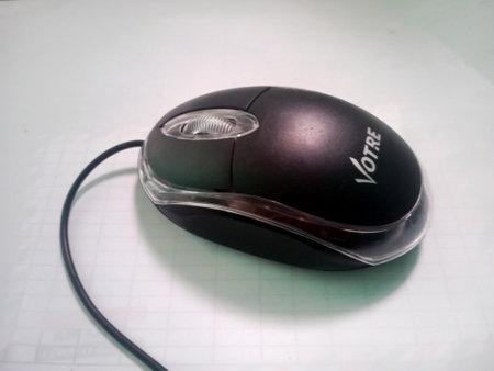 Computer mouse on a white background. The concept of technology and communication.の写真素材