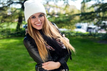 Outdoor fashion portrait of beautiful girl in the city.