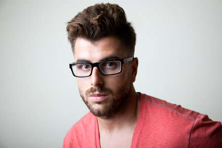 Portrait of elegant young handsome man. Studio fashion portrait.