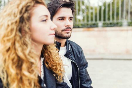 Portrait of beautiful young couple in the park.の写真素材