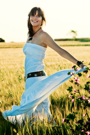 Outdoor portrait of Beautiful young woman in springの写真素材