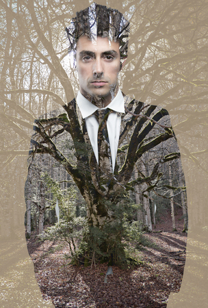 Double exposure portrait of young confident Businessman looking at the camera