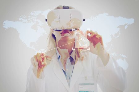 Double exposure of woman doctor using a virtual reality headset and touching two points in a world...