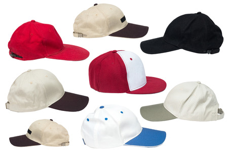 Collection of baseball caps isolated on a white background の写真素材