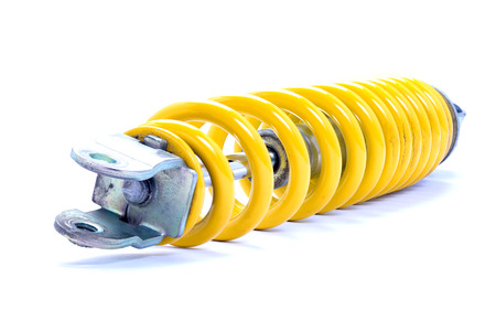 Yellow Shock absorber. isolated on white backgroundの写真素材