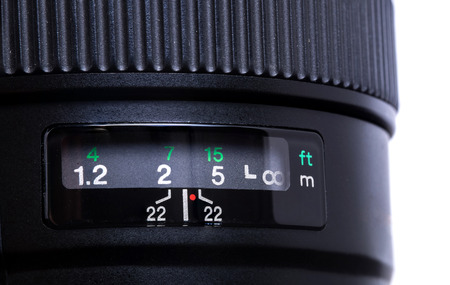 Close - up of camera lens aperture scale isolated on white backgroundの写真素材