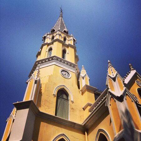 A temple in Thailand with European style and blue sky backgroundの素材