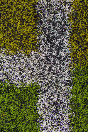 Green artificial turf pattern with a lineの写真素材