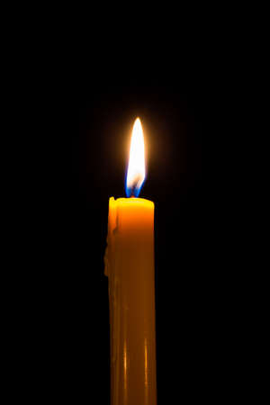 Candle on the dark backgroundの写真素材