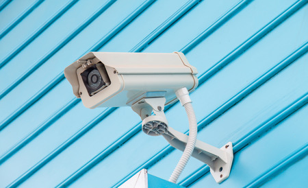 Closed circuit television on the blue backgroundの写真素材