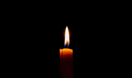 Candle on the dark backgroundの写真素材