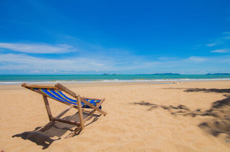 Canvas chair on beach and blue skyの写真素材