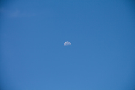 Moon on the blue skyの写真素材