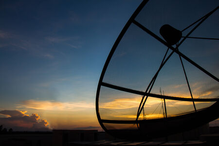 Satellite dish at twilight timeの写真素材