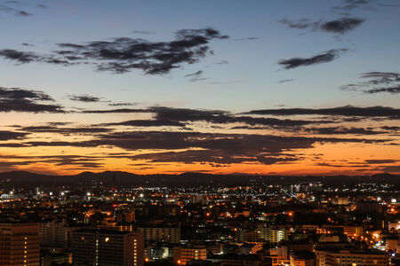 Sunrise and city with beautiful sky at twilight timeの写真素材