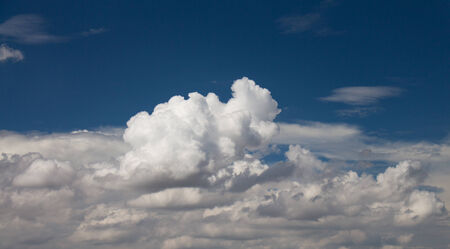 Clouds on the blue sky in cloudy daysの写真素材