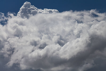Clouds on the blue sky in cloudy daysの写真素材