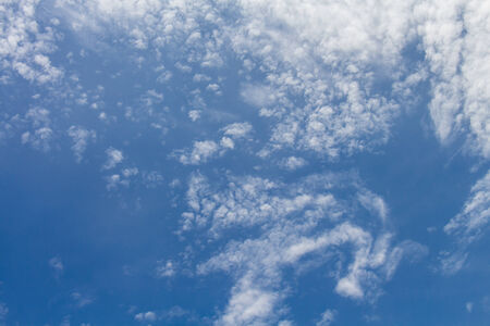 Clouds on the blue sky in cloudy daysの写真素材