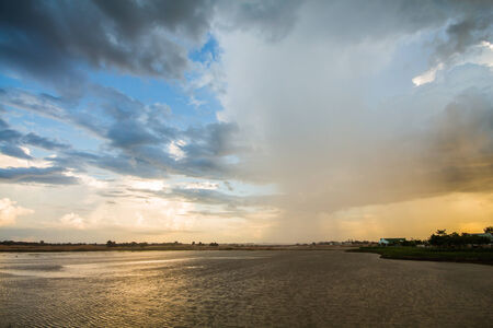 Different weather rainy and cloudy skyの写真素材
