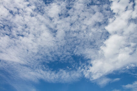 Clouds on the blue sky in cloudy daysの写真素材