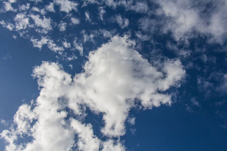 Clouds on the blue sky in cloudy daysの写真素材