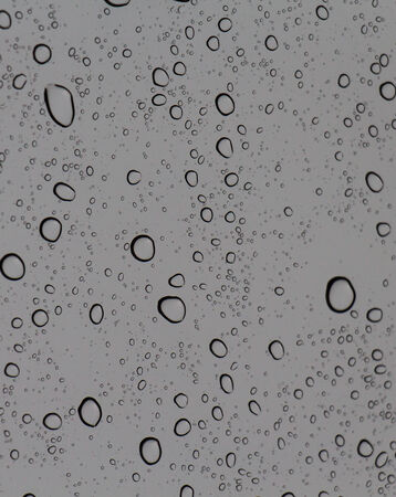 Drop water on the windowsの写真素材