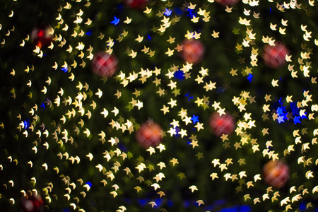 Defocused star bokeh on christmas light backgroundの写真素材