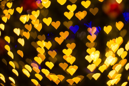 Color Bokeh heart shape backgroundの写真素材