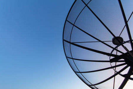 satellite dish antenna in the blue skyの写真素材