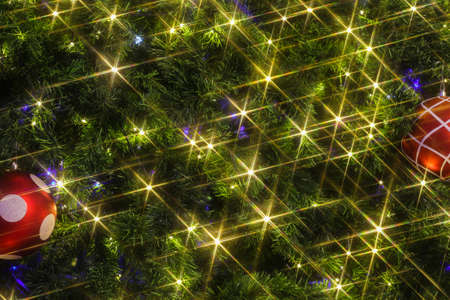 Christmas background with a red ornamentの写真素材