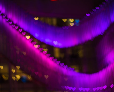 Color Bokeh heart shape backgroundの写真素材