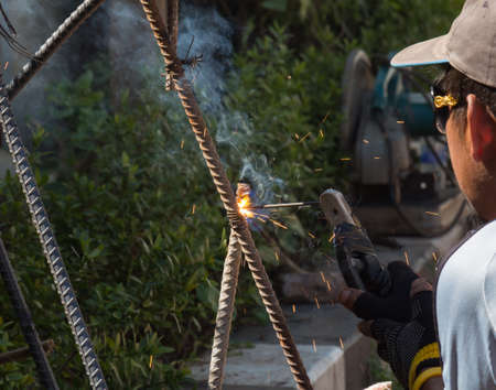Worker were welding on a construction siteの写真素材