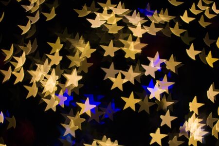 Color Bokeh star shape backgroundの写真素材