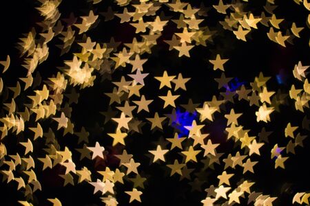 Color Bokeh star shape backgroundの写真素材