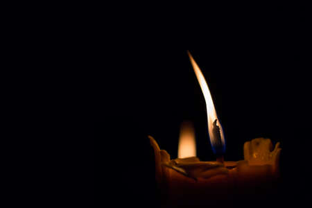 Candle flame at night closeup