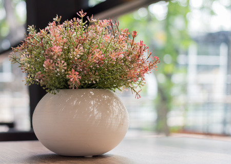 Decorative flower on the wood tableの写真素材