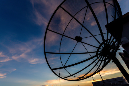 Satellite dish at twilight timeの写真素材