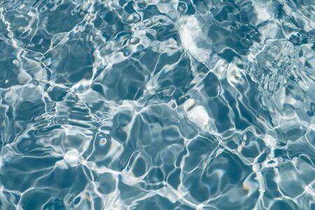 Blue water with ripple surface backgroundの写真素材