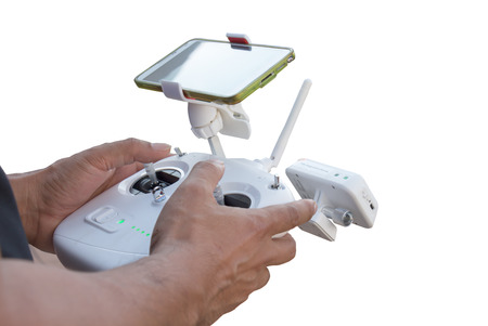 Controlling a remote helicopter drone with smartphone preview isolatedの写真素材