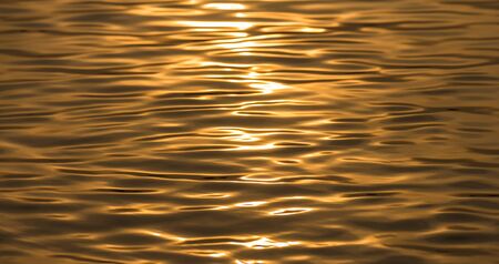 Surface art of water with sunsetの写真素材