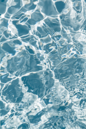 Beautiful pattern of blue water reflecting the sun.の写真素材