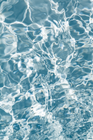 Beautiful pattern of blue water reflecting the sun.の写真素材