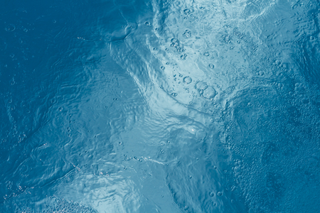 Beautiful pattern of blue water reflecting the sun.の写真素材